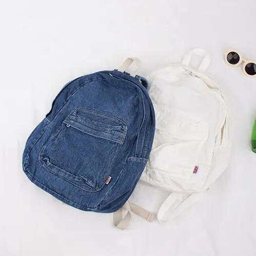  Classic Denim Backpack with Spacious Design and Casual Appeal